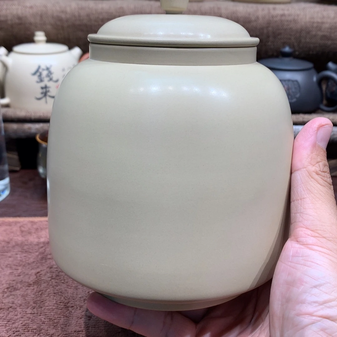 龙***～泥塑放漏白泥醒茶罐一个