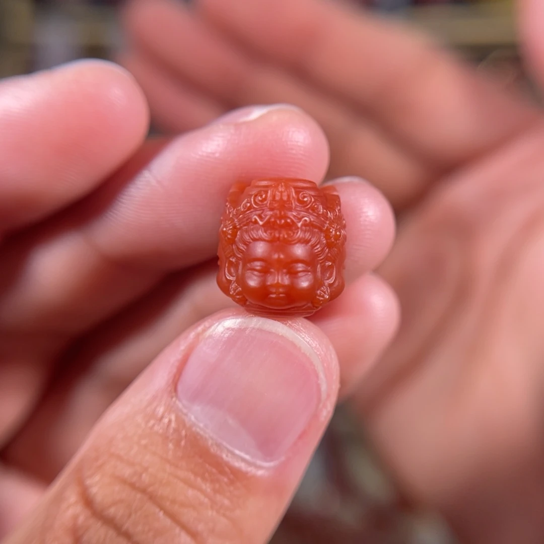 南红玛瑙大黑洞三面宝宝观音12.4*11.8未镶嵌
