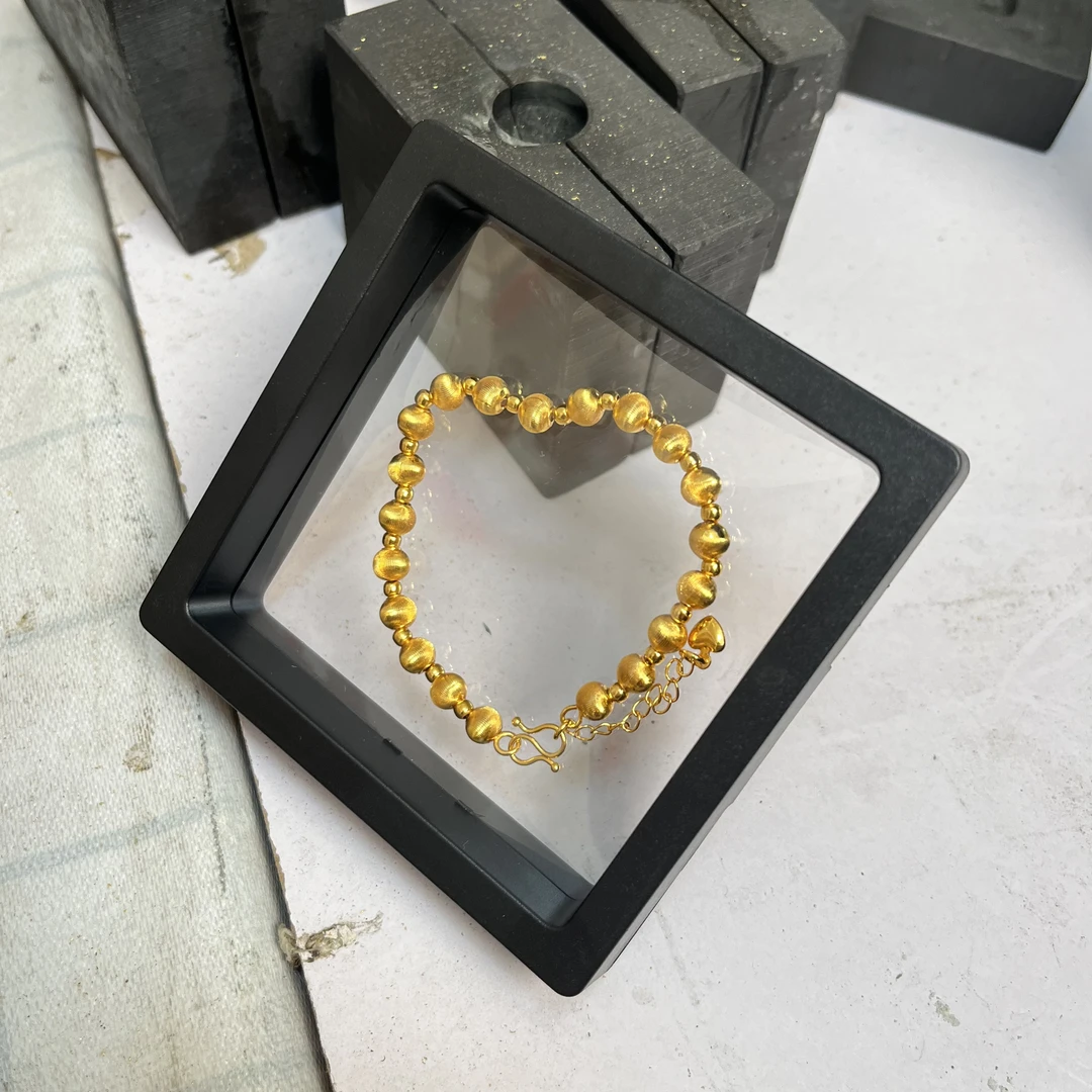 金色古玩收藏猫眼珠摆件手把件 可佩戴