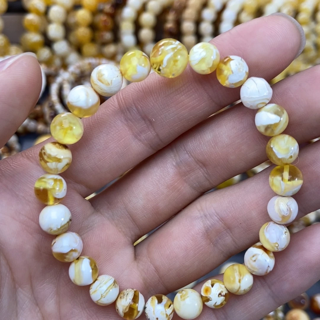 琥珀未镶嵌手链7+mm金漆白溶洞