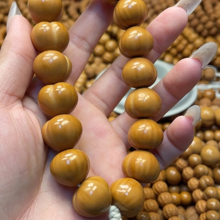 核桃全品亮面大屁桃手持