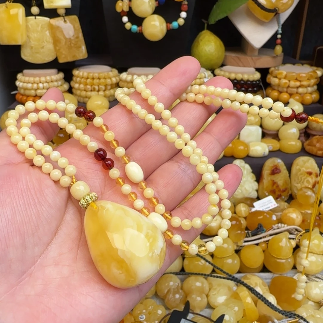 琥珀未镶嵌套链焦皮料金白妖花蜜蜡水滴吊坠