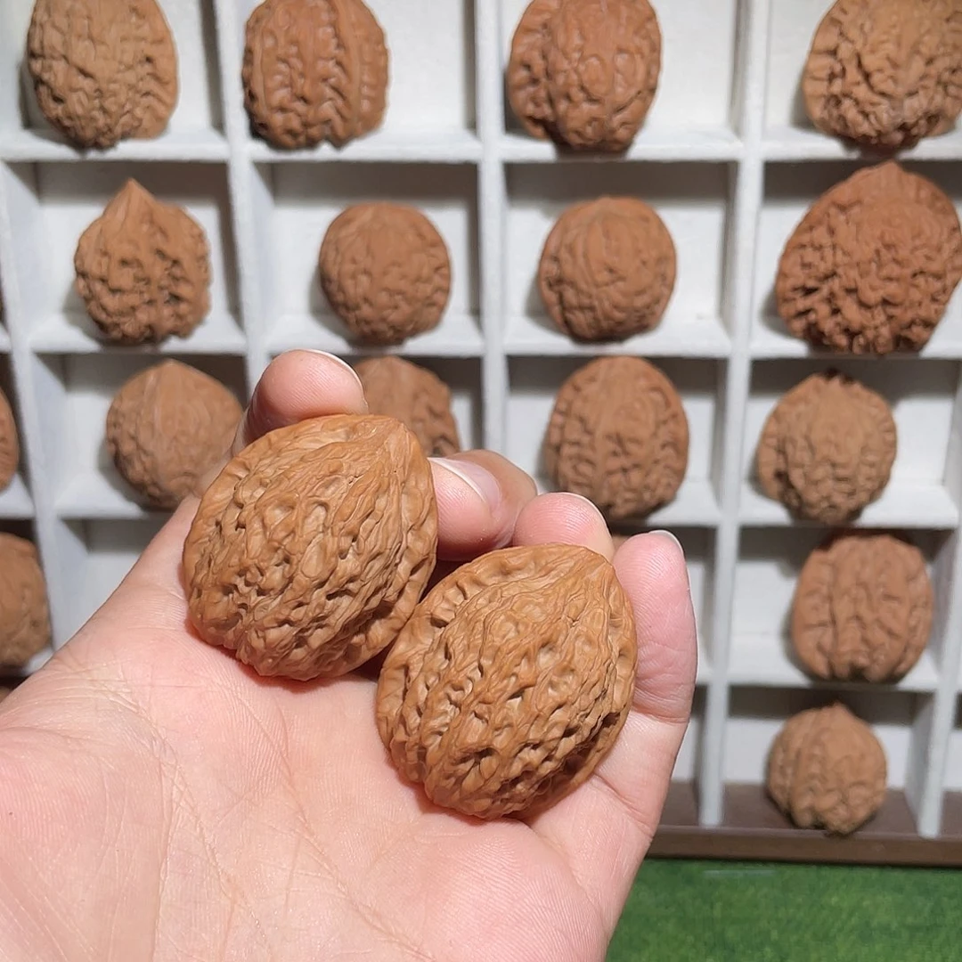 记***️文玩核桃把件有虫眼鸡心