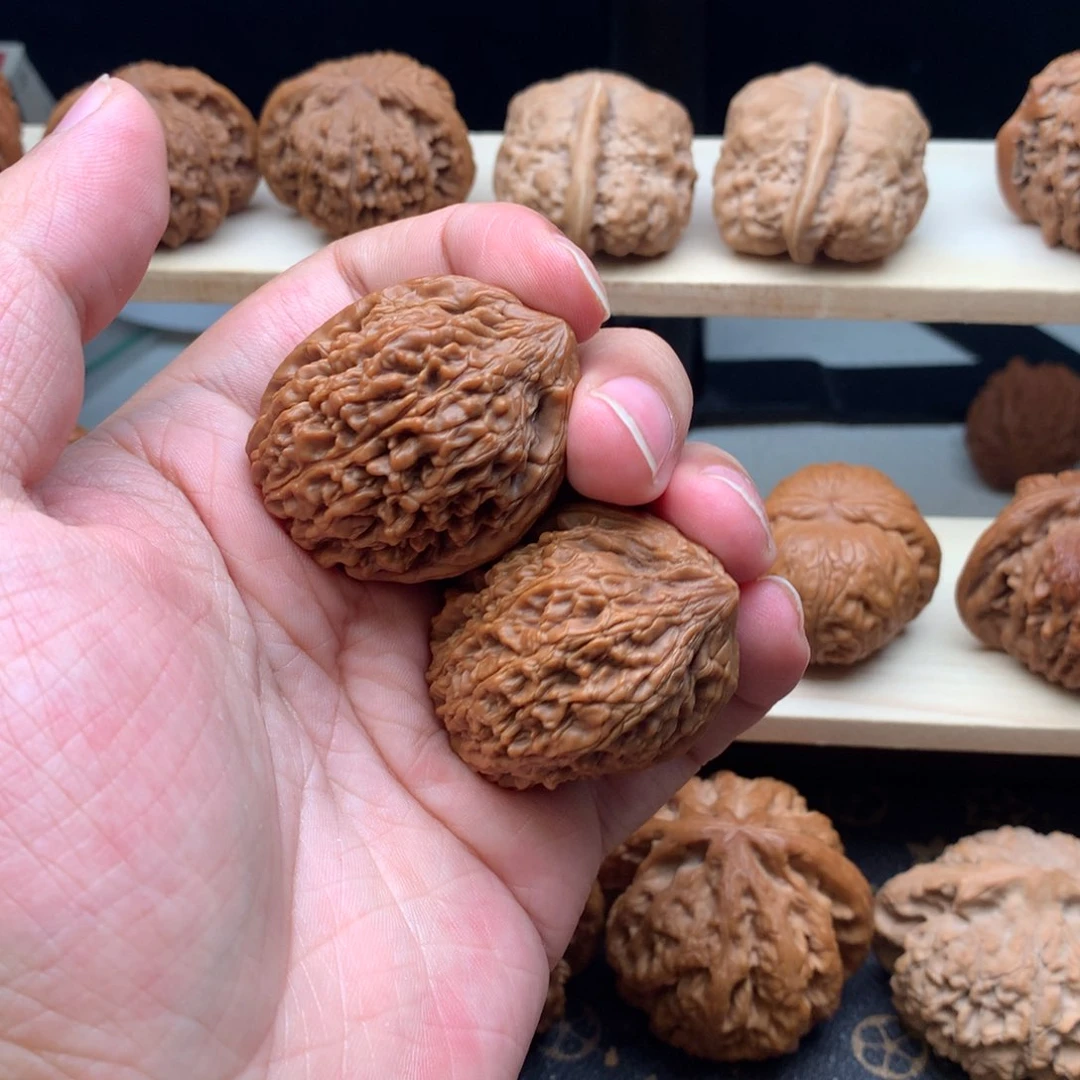 文玩核桃把件V****腿罐子