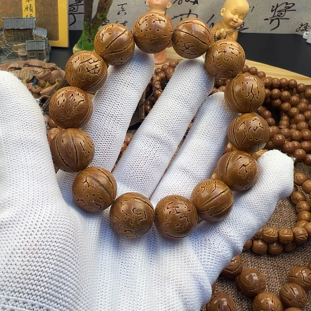 赳***秦桃核吊坠17加桃核