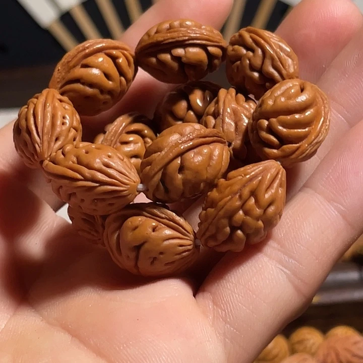 *****碧桃核肌肉纹手串