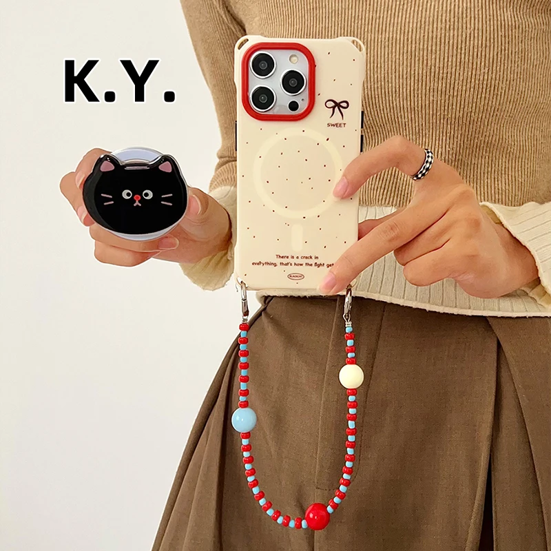 卡通红鼻黑猫磁吸支架手机壳带挂绳适用于苹果小米17华为手提斜挎