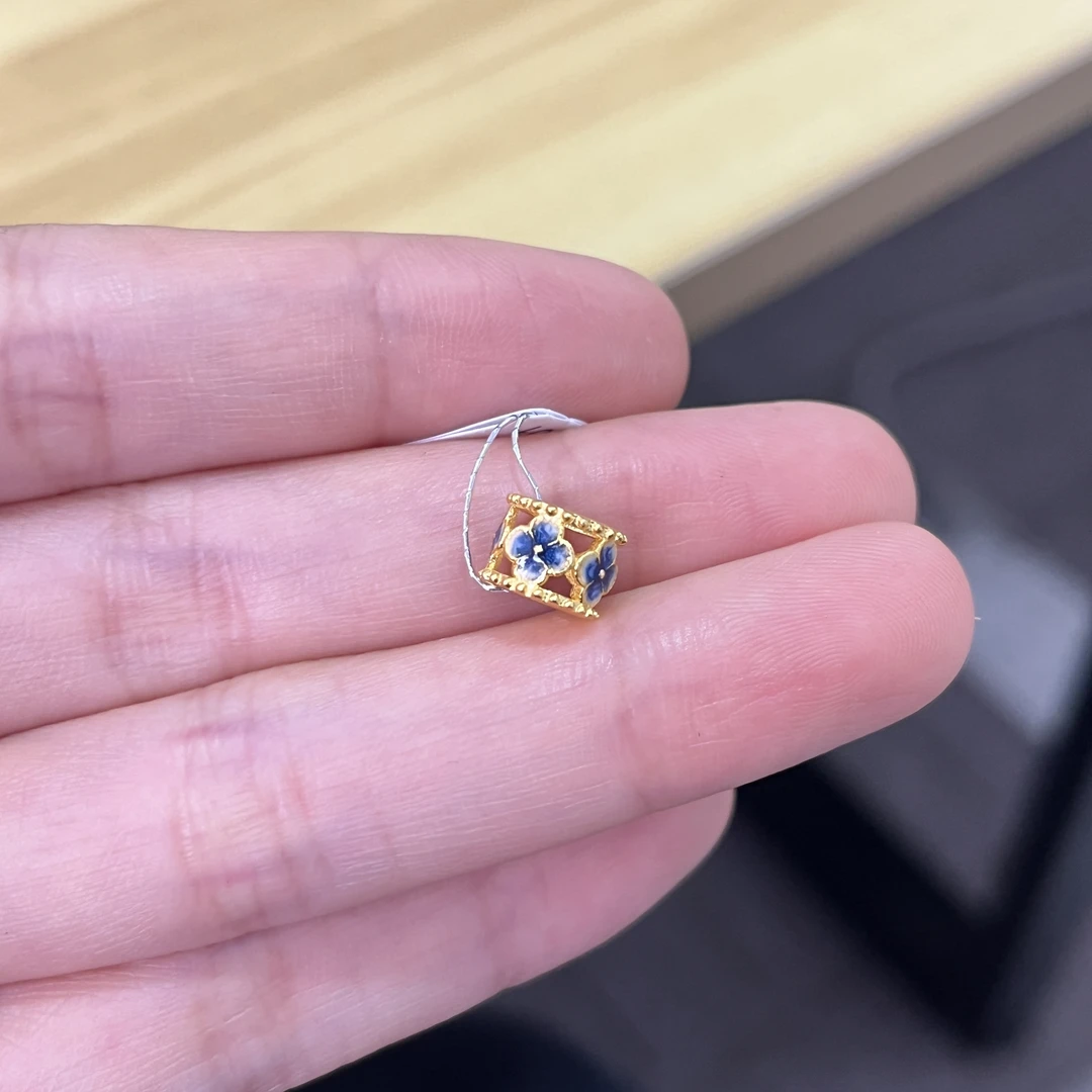 00福利-墨蓝万花筒通孔 足金999 总重