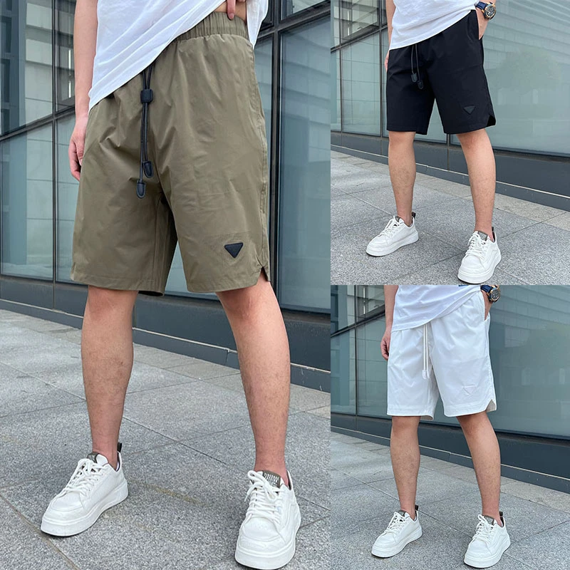 男士短裤白色时尚简约潮流网眼五分裤沙滩运动休闲裤透气宽松纯色