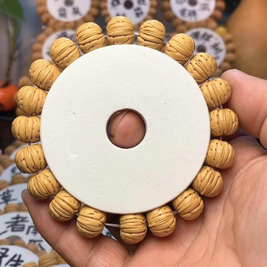 【闪购商品】最**￴桃核手串纽扣手串