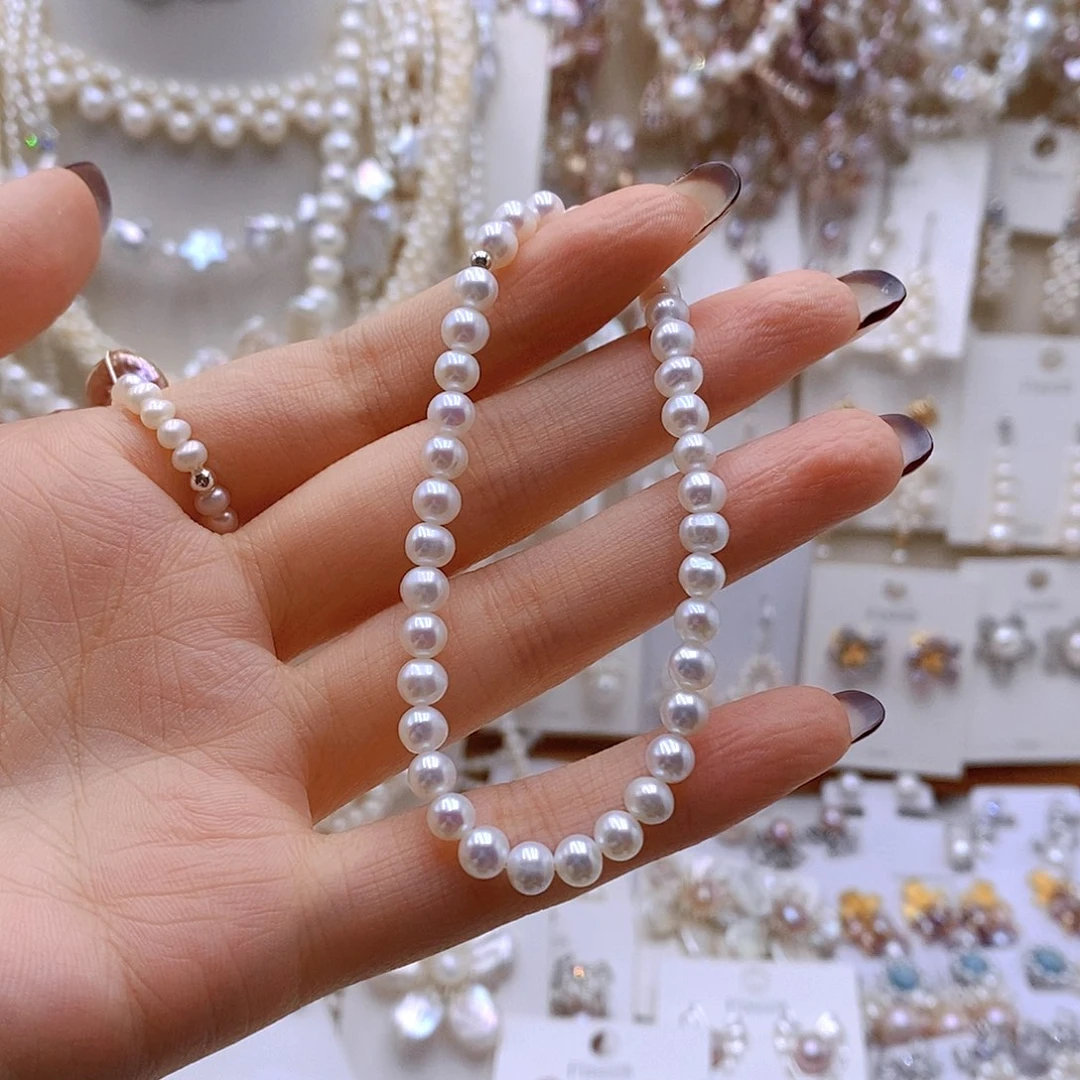 只***_淡水珍珠银S925镶嵌耳饰