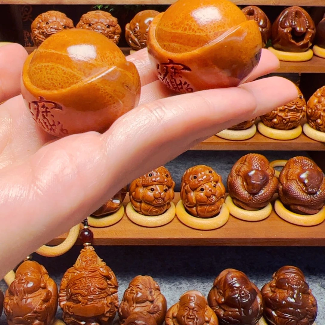 橄榄核手串F****e元宝一对