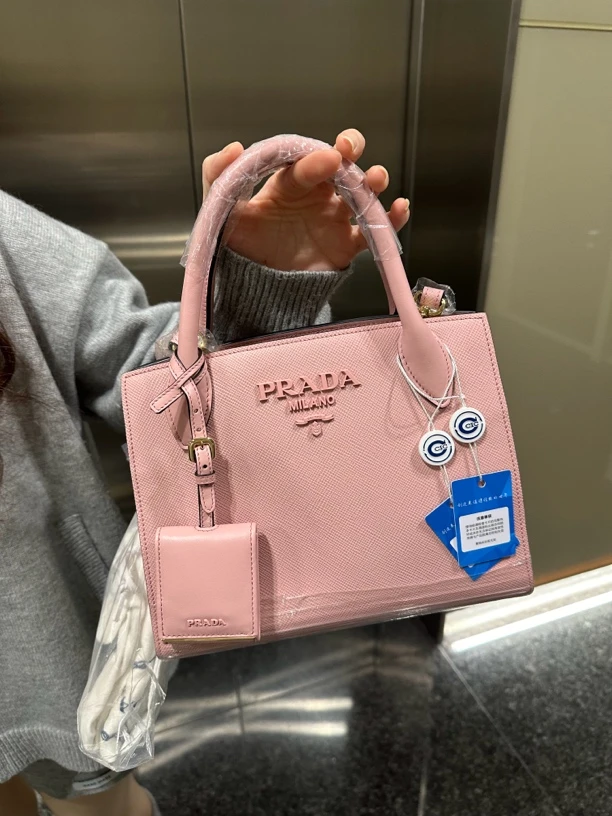 95新 Prada/普拉达 新款专柜在售樱花粉单肩手提包