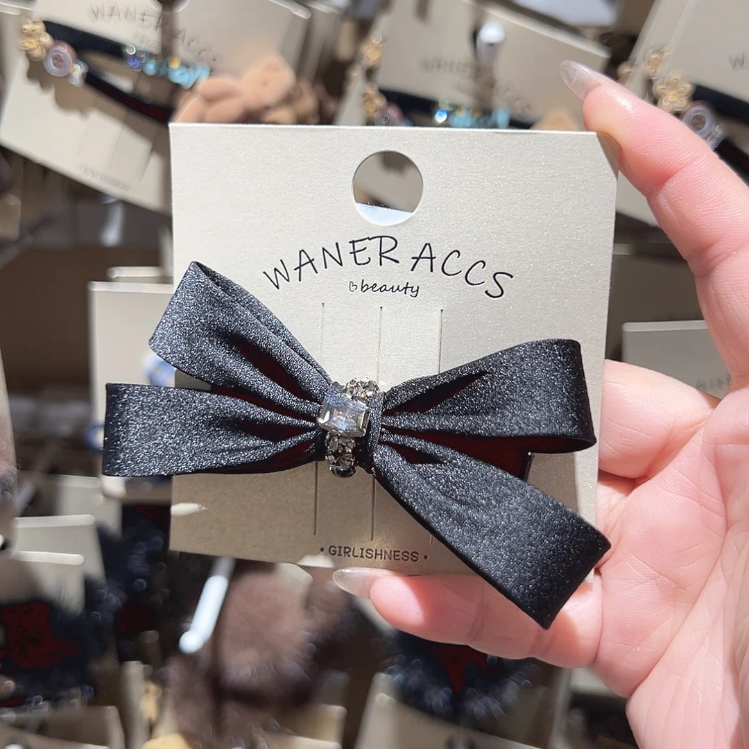 非金属黑色缎面蝴蝶结鸭夹