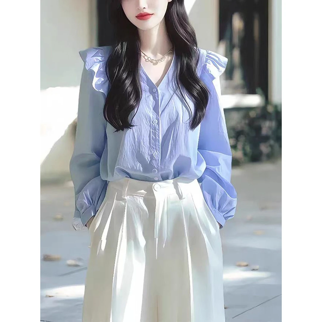 今年流行的漂亮小衫轻奢高级感法式小众绝美蓝色长袖衬衫女新款秋