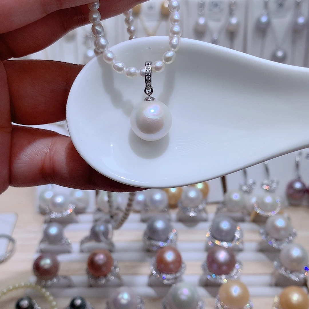 淡水珍珠银S925镶嵌吊坠(赠链)向***贝CC12m m