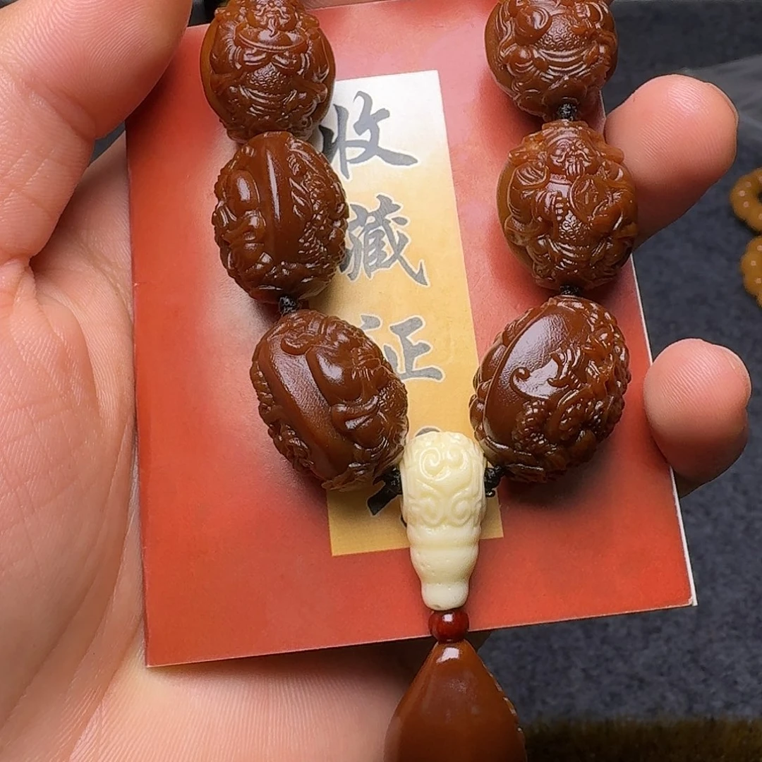 橄榄核手串飞轮海