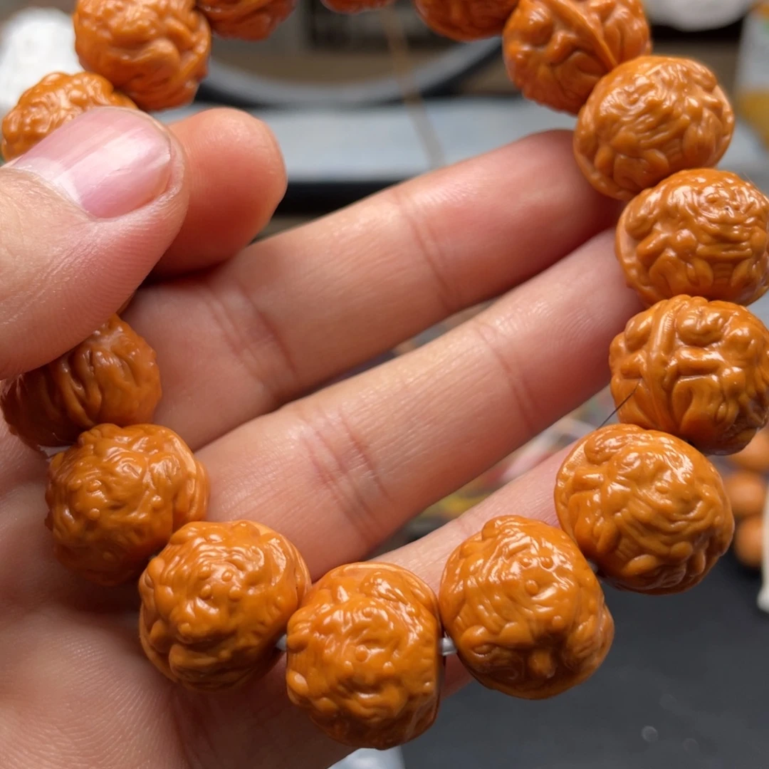 橄榄核吊坠猴头虎面