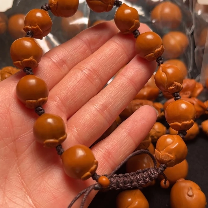 善***导吊坠橄榄核寿桃14