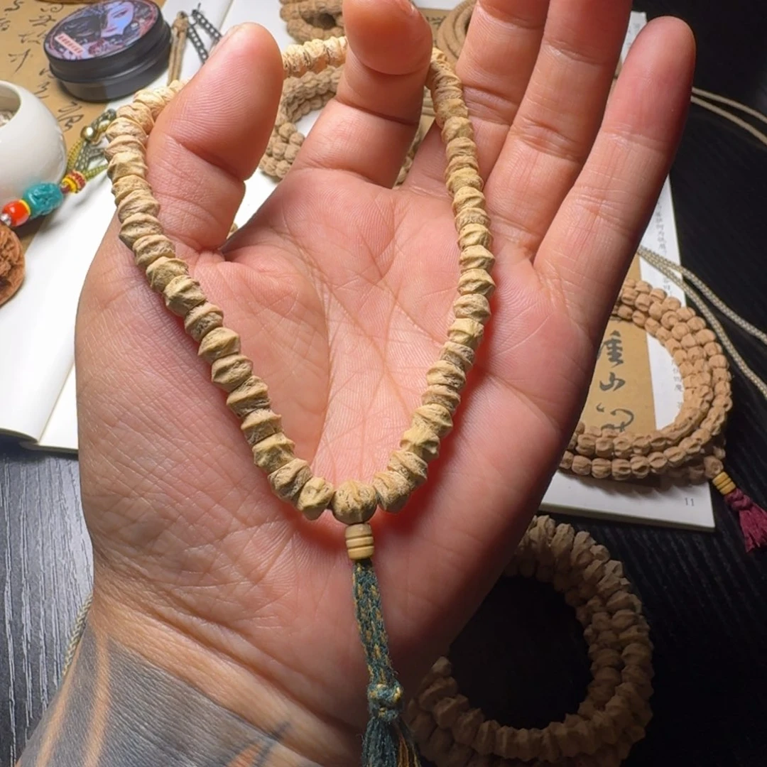 柏香籽/百香籽吊坠手持