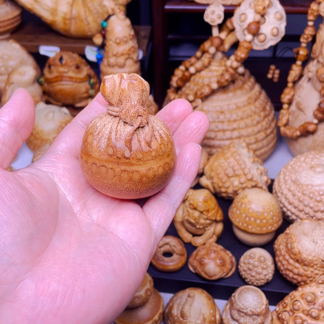 竹竹根雕钱袋子把玩件