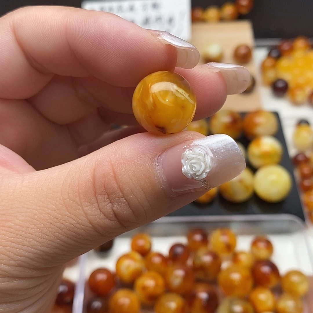 郑***瑶裸石虫珀未镶嵌蜜蜡