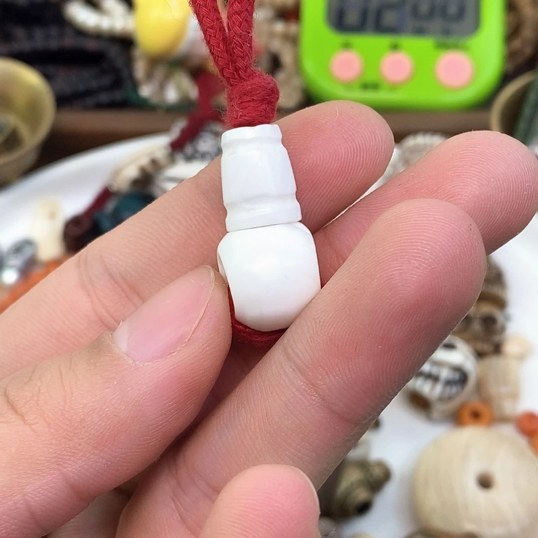 柏香籽/百香籽吊坠牛****娘