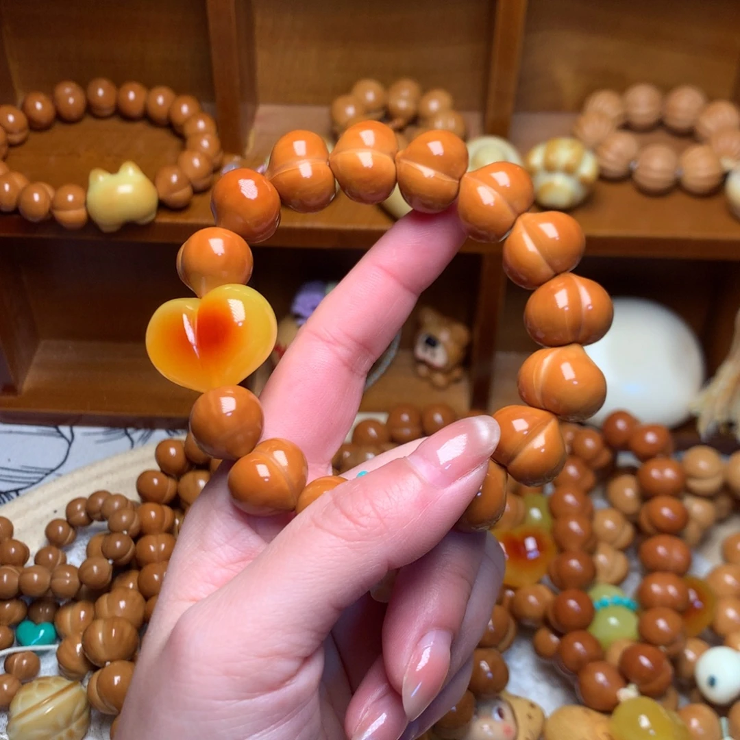 猴头核桃把件16玻璃底屁桃手串爱心