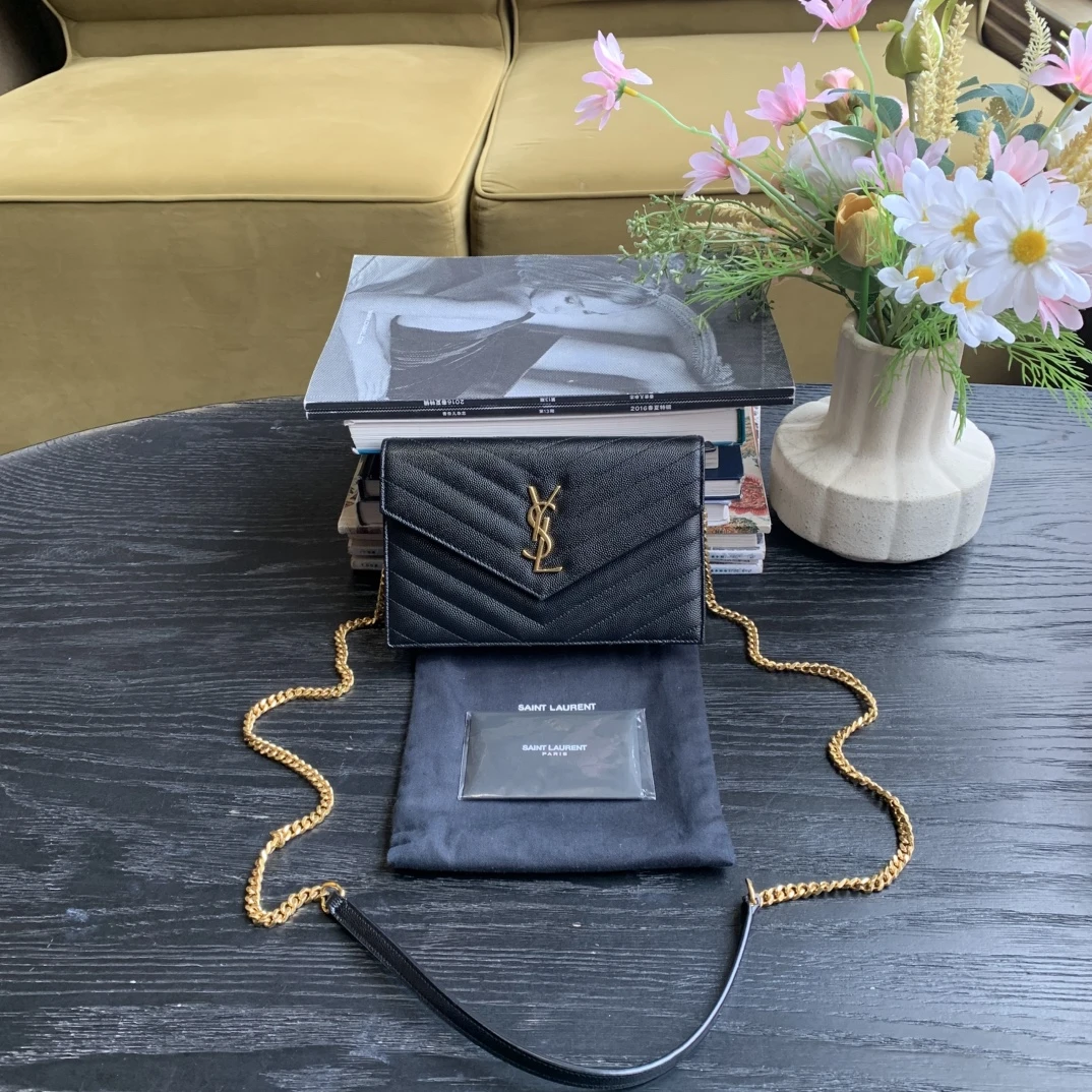 95新 YSL/圣罗兰 YSL 圣罗兰黑金鱼子酱 woc信封 98新/sp22902