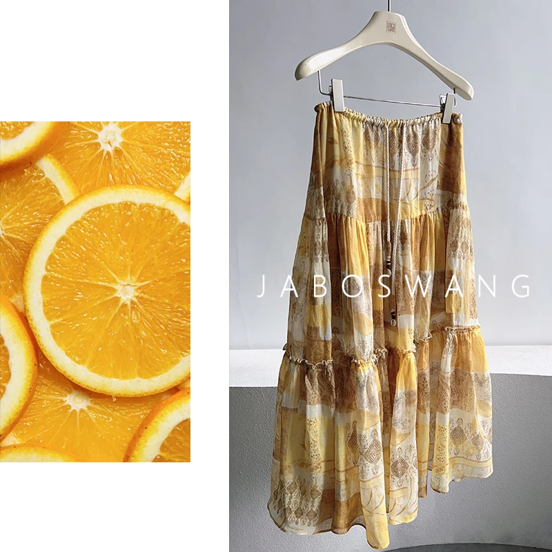 K276柠檬茶半裙2025夏季新款时尚百搭圆领印花拼接度假风