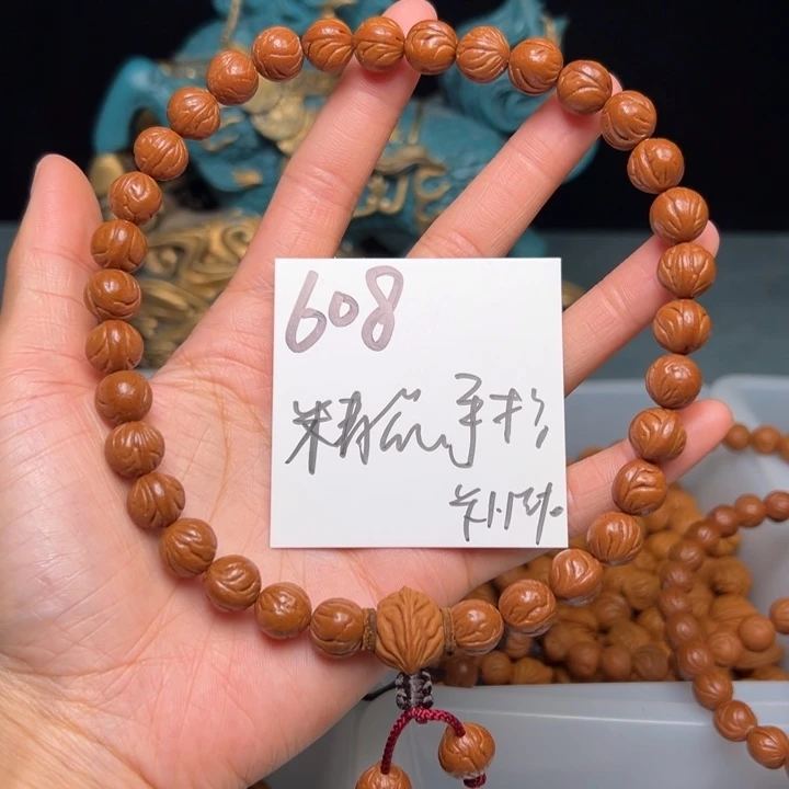 桃核把件陌***?秦岭野生龙纹桃核玉龙脊