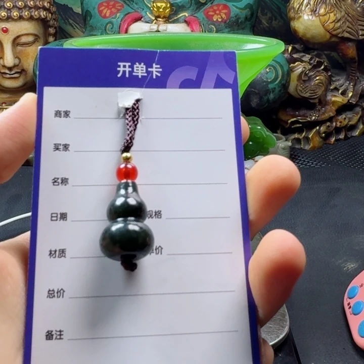 和田玉未镶嵌颈饰乌**石