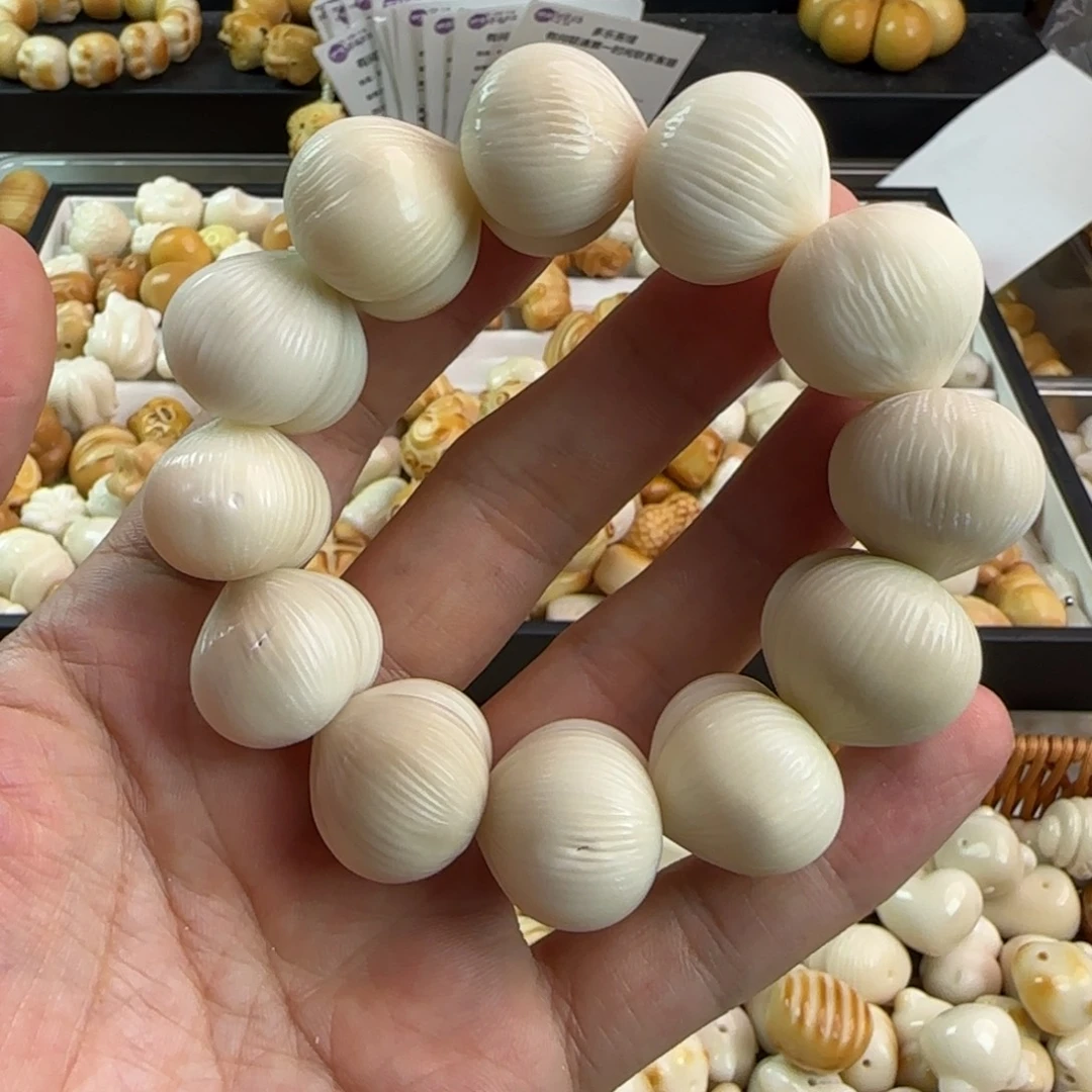吊坠菩提根/象牙果瑕疵白色拉丝屁桃一串