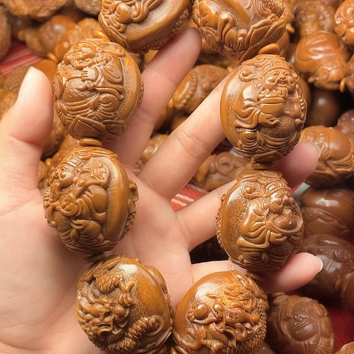 德***，橄榄核吊坠橄榄核手持