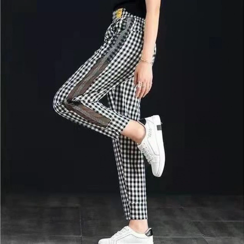 黑白格子裤女网纱拼接休闲裤年春夏季新款薄款百搭九分哈伦裤