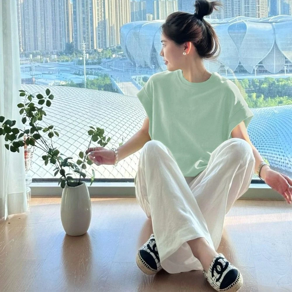 青柠绿色圆领短袖T恤女新款夏季多巴胺穿搭温柔减龄宽松遮肉上衣