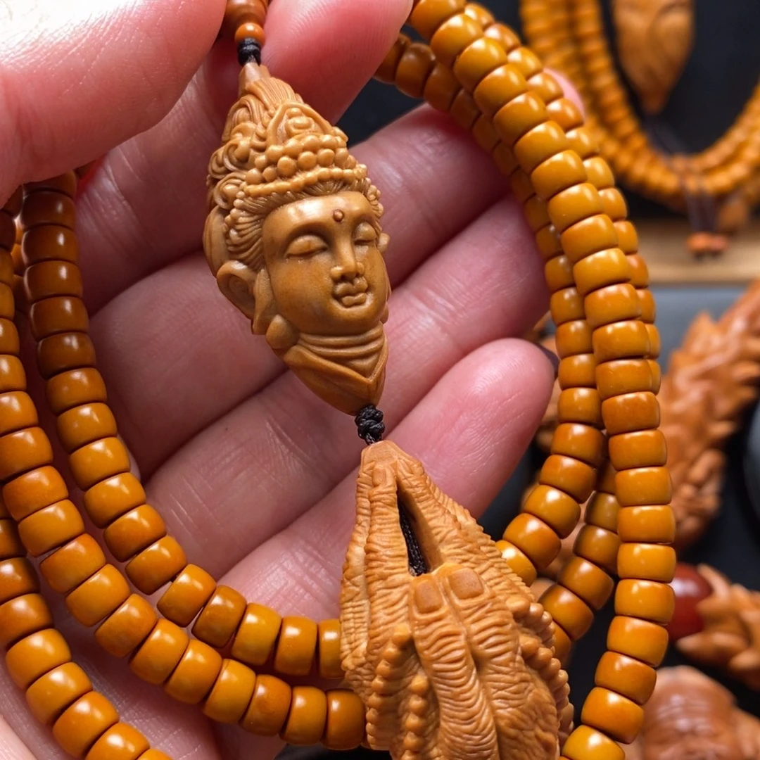 橄榄核手串观音脖挂