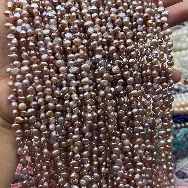 玛瑙/玉髓未镶嵌珠宝半成品一条粉紫花瓣巴洛克珍珠