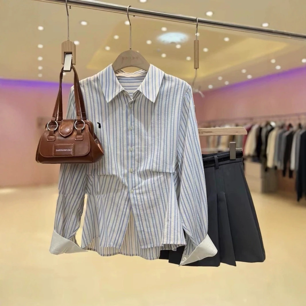 春季新款韩版高级感蓝色条纹长袖衬衫设计感小众收腰减龄显瘦衬衣