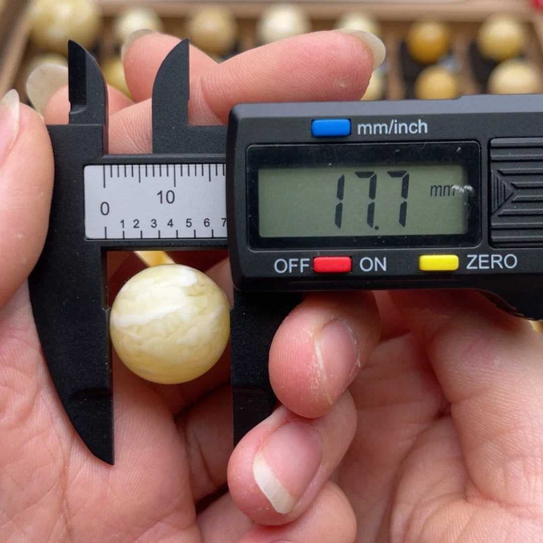 裸石琥珀未镶嵌蜜蜡微瑕虎皮纹圆珠鸽