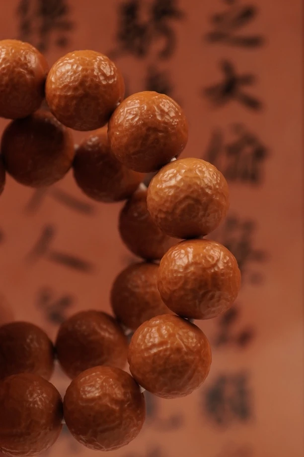【舍利】精雕猴头核手串（金银标）