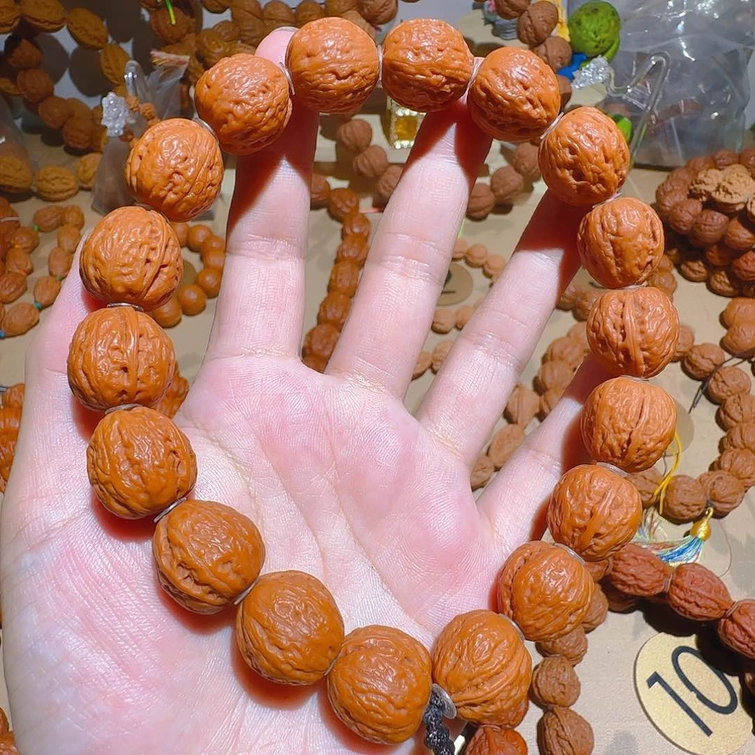 文玩核桃吊坠京八棱蜜纹手持