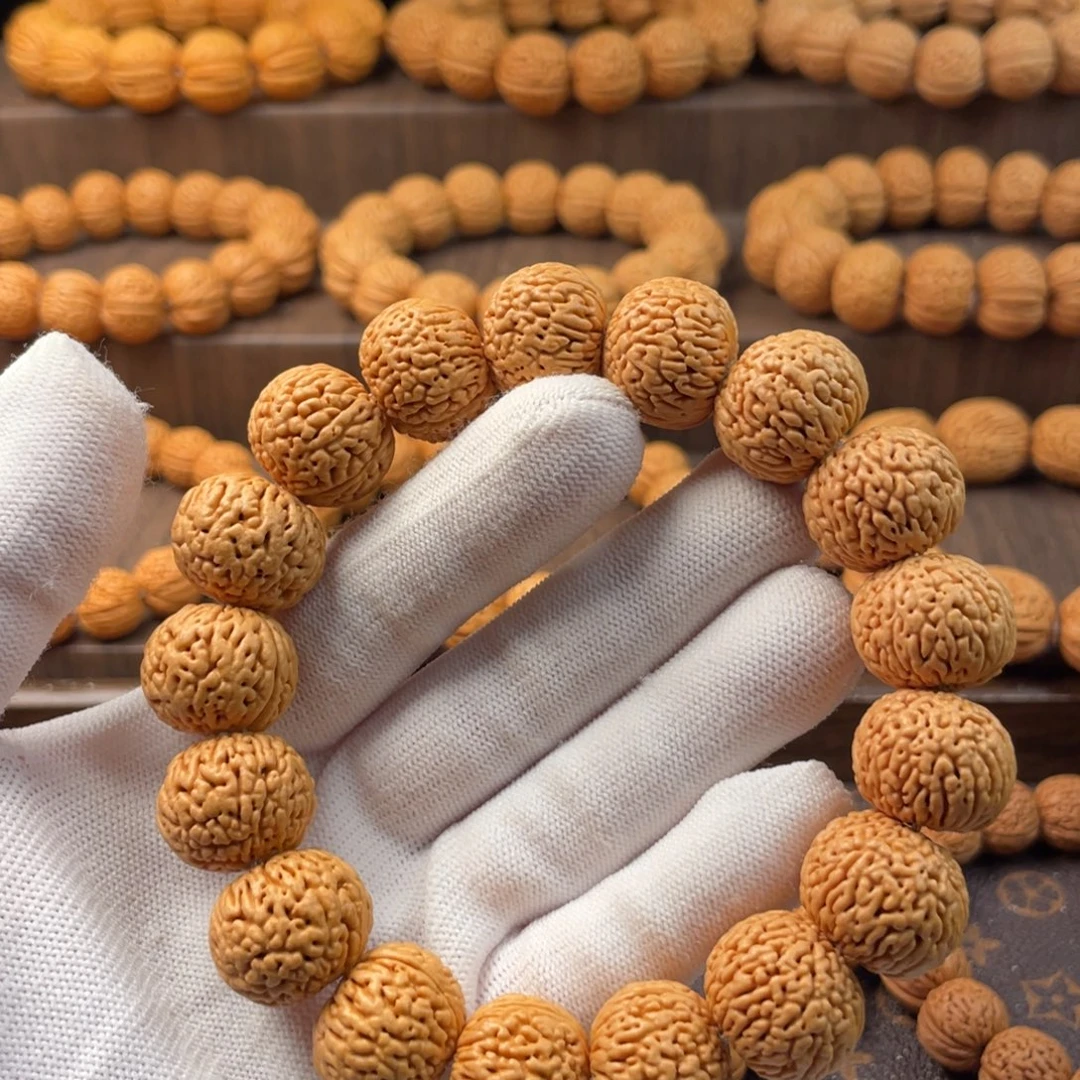 喜***。吊坠桃核龙鳞苹果