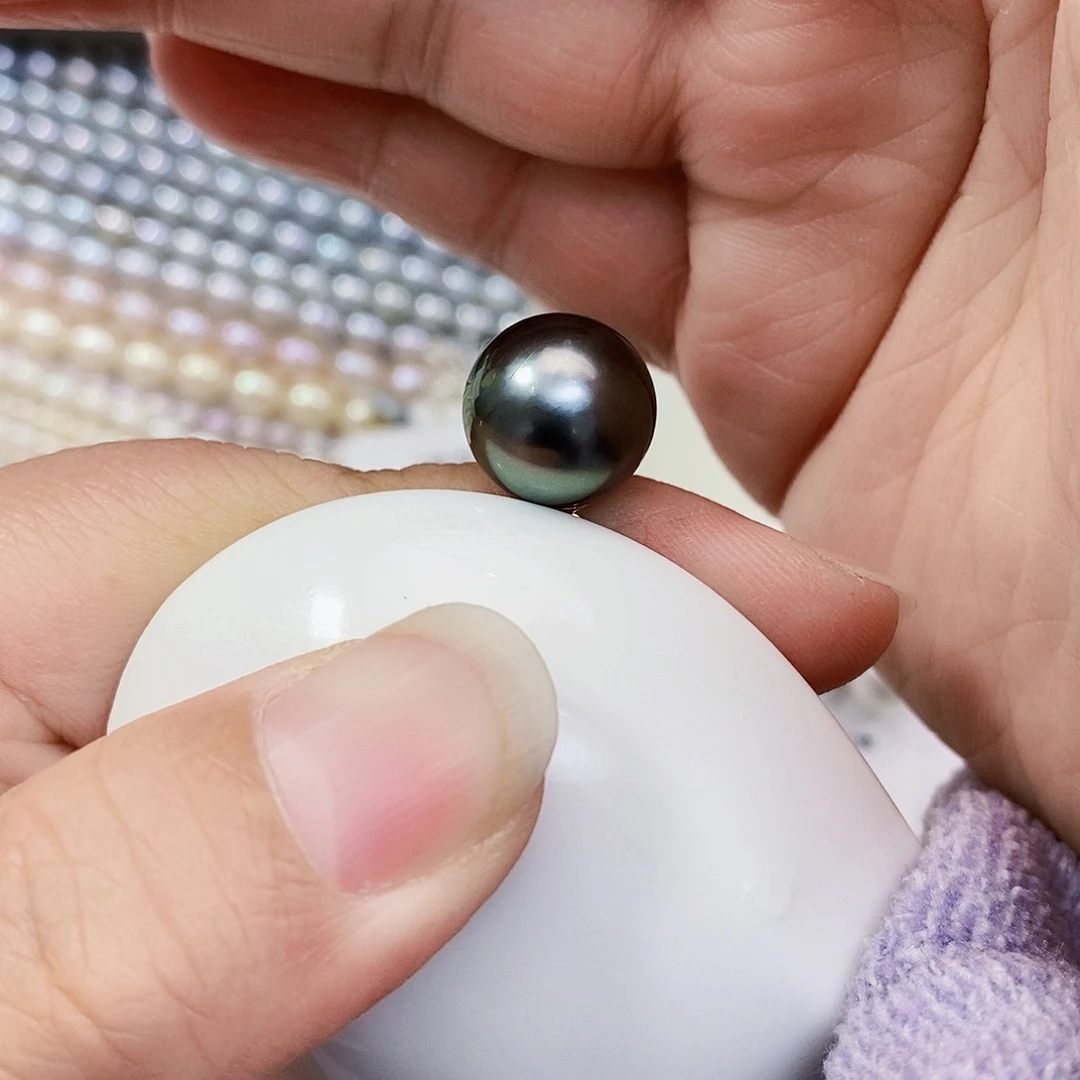 海水珍珠特价不退换大溪地吊坠18K金镶嵌小***游