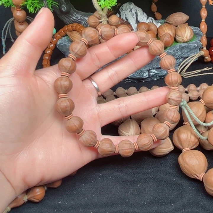 吊坠橄榄核M**生1.3+