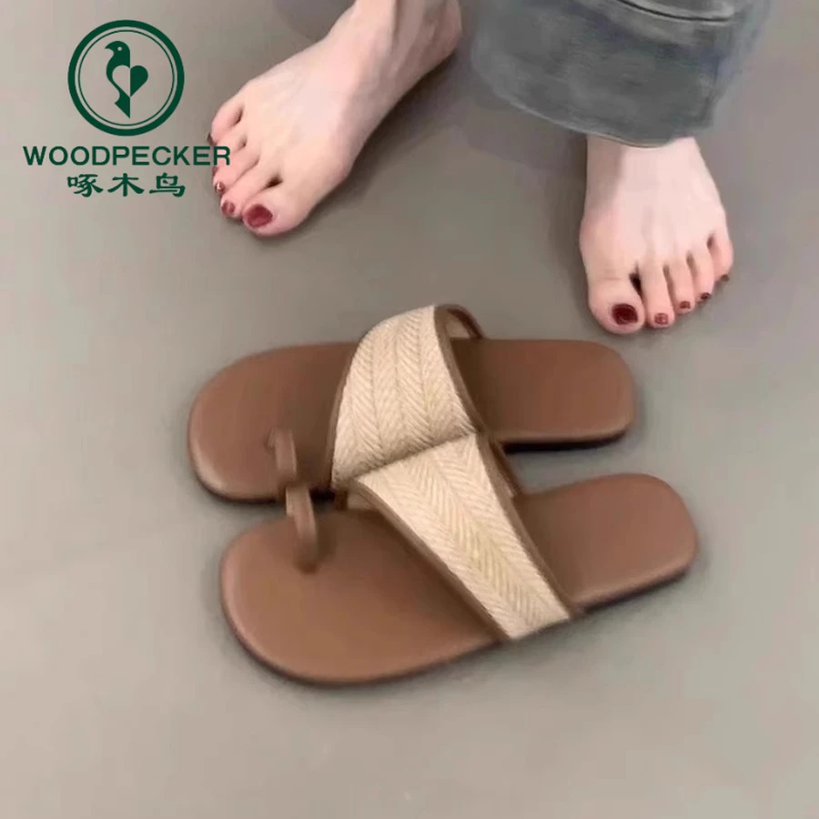 啄木鸟平底编织套趾凉拖鞋女2025年配裙子度假风海边沙滩一字拖鞋