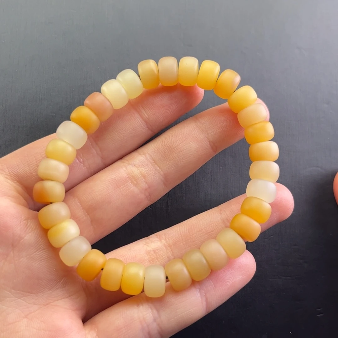 石英质玉黄蜡石手串未镶嵌金**堂