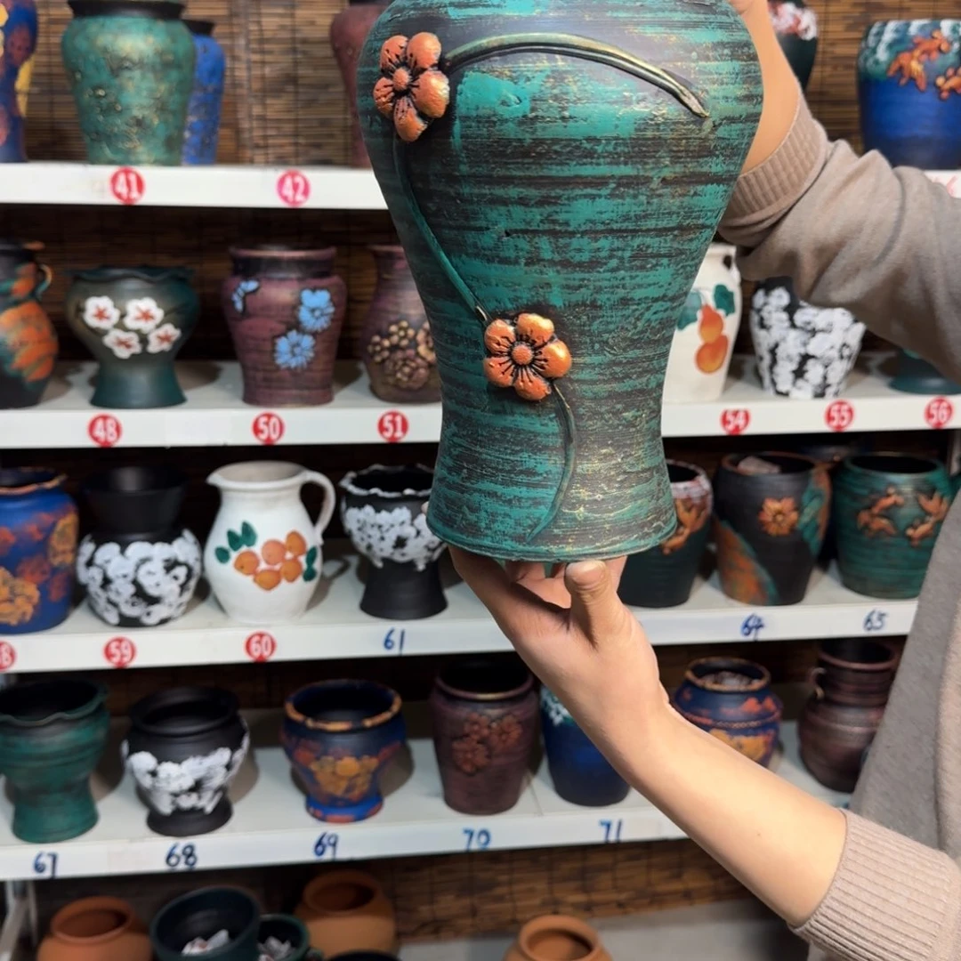 红陶浮雕花盆炸炸炸了