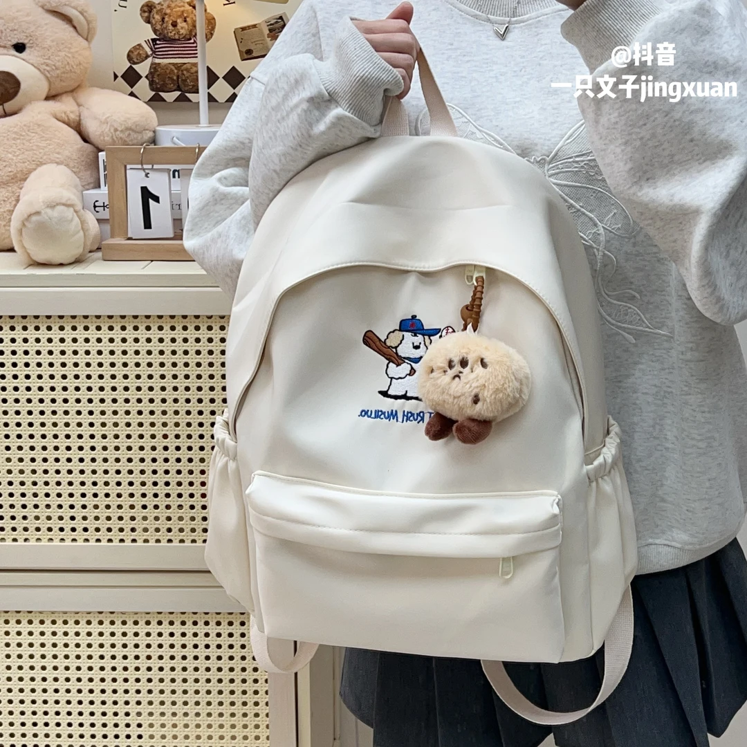 书包简约日系可爱卡通双肩背包初中高中大学生上学旅行轻便大容量