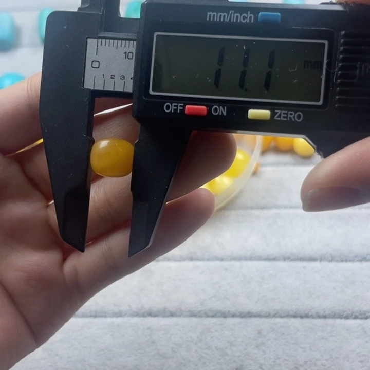 蜜蜡裸石未镶嵌天然蜜蜡老型11*9mm尺寸单颗妖花款微瑕